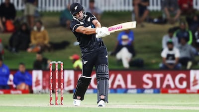 New Zealand’s Colin de Grandhomme hits out during the third one-day international. AFP