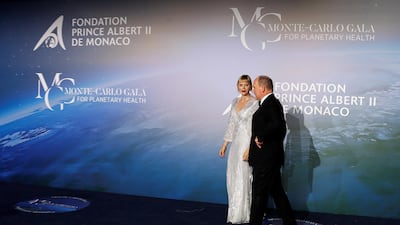 Prince Albert II of Monaco and Princess Charlene of Monaco pose on the red carpet ahead of the 2020 Monte Carlo Gala for Planetary Health in Monaco. EPA