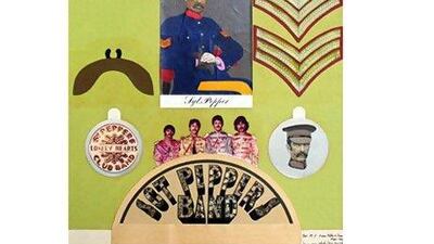 Peter Blake with the album art - insert on the left, cover on the right - for Sgt. Pepper's Lonely Hearts Club Band. PA Archive / Press Association Images