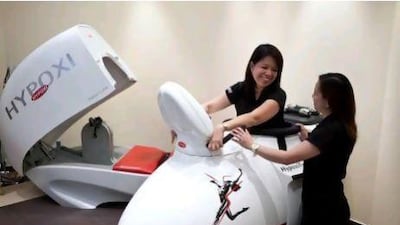 Using the Hypoxi machine is a little like cycling in a life-support pod from a science fiction film, says Hugo Berger. Silvia Razgova / The National