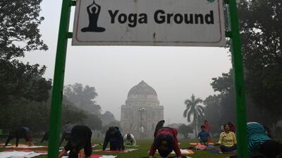 A designated yoga area in Lodhi Gardens on September 15, top and November 2. AFP