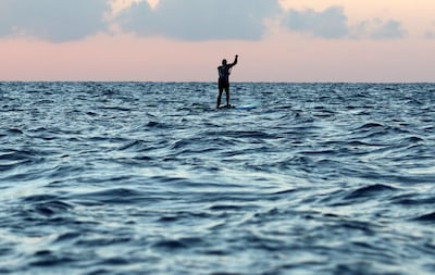 Cypriot stand-up paddle boarder Christis Michaelides paddles from Cyprus to Lebanon to raise funds for Beirut, on October 16. Reuters