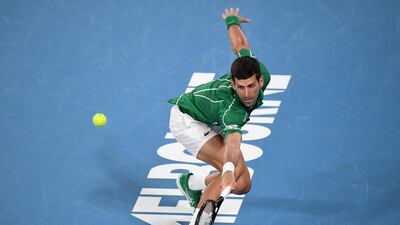 Novak Djokovic hits a return. AFP