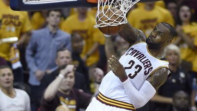 Cleveland Cavaliers forward LeBron James dunks against the Toronto Raptors during the first half of Game 5 of the NBA basketball Eastern Conference finals, Wednesday, May 25, 2016, in Cleveland. (Frank Gunn/The Canadian Press via AP)