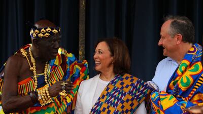 US Vice President Kamala Harris and her husband Doug Emhoff receive Kente cloths from Chief Osabarima Kwesi Atta II in Ghana, on March 28. AFP