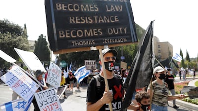 Anti-Netanyahu protesters demonstrate outside of the Knesset in Jerusalem on September 29, 2020 amid a national coronavirus lockdown in Israel. EPA