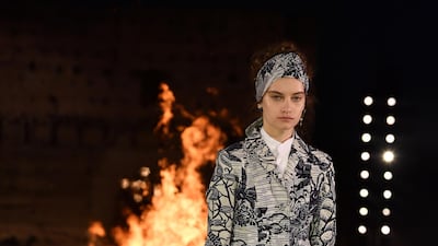 A model walks the runway during the Christian Dior Cruise 2020 show. Getty Images