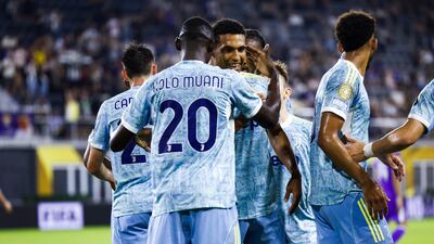 Randal Kolo Muani, second left, celebrates with teammates. EPA