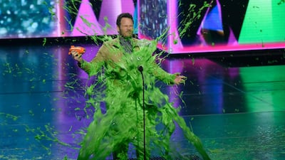 Chris Pratt gets slimed as he accepts the award for "favourite butt-kicker" for 'Jurassic World: Fallen Kingdom'. AP
