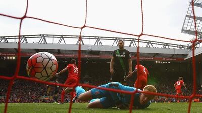 Jakob Haugaard of Stoke City looks on as Alberto Moreno of Liverpool scores their frist goal during the Premier League match between Liverpool and Stoke City at Anfield on April 10, 2016 in Liverpool, England. (Photo by Clive Brunskill/Getty Images)