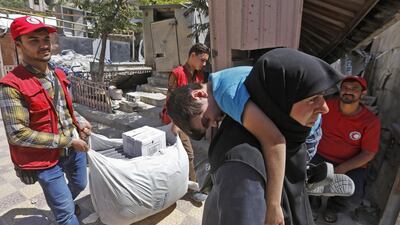 A humanitarian aid operation co-ordinated between Moscow and Paris, the first such mission between Russia and a western country. Louai Beshara / AFP