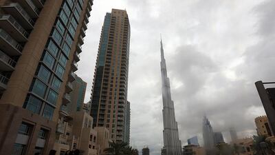 Most of the country experienced rain and cool temperatures on Saturday, but the dark clouds are expected to break up by Sunday afternoon, according to the National Centre of Meteorology and Seismology. Satish Kumar / The National