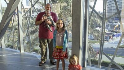 (L-R) Ian Sinnott and his children, Jacob, Maria and Lily Rose. Reem Mohammed / The National