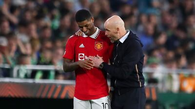 Manchester United manager Erik ten Hag, right, speaks to goalscorer Marcus Rashford after the game against Real Betis. Getty