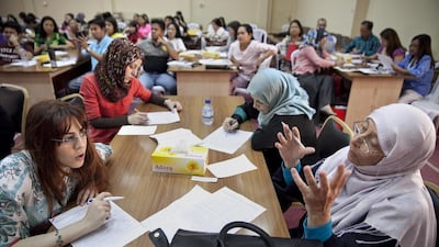 Teachers take part in a workshop in Abu Dhabi. A survey has shown that mandatory training for public school teachers across the country is often repetitive, irrelevant or conducted by unqualified instructors. Silvia Razgova / The National