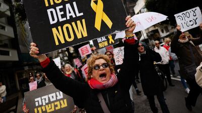 People protest in Tel Aviv on Thursday, demanding a hostage deal to end the violence between Israel and Hamas in Gaza. Reuters