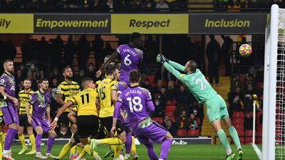 Tottenham Hotspur defender Davinson Sanchez heads home the winning goal against Watford. AFP