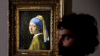 Debate continues in the art world as to whether the earring in Vermeer's 'Girl with a Pearl Earring' is really an earring. AFP