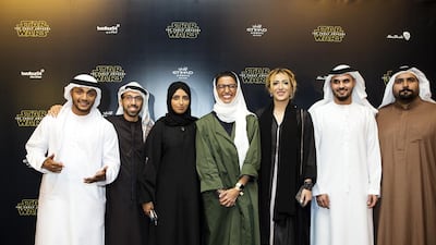 Noura Al Kaabi chief executive of Media Zone Authority - Abu Dhabi (MZA) and twofour54, center, arrives with members of her team that worked on the set ahead of the Star Wars: The Force Awakens, Middle East premiere at Emirates Palace in Abu Dhabi. Christopher Pike / The National