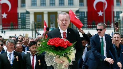 Turkish President Recep Tayyip Erdogan (C) visiting Martyrs Memorial on the third anniversary of the failed coup attempt at the Presidential Palace in Ankara, Turkey. EPA
