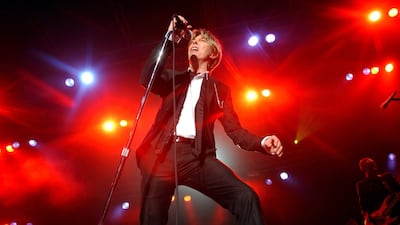 David Bowie performs on stage during a concert in Norway in 2002. The late musician's estate is reported to be in advanced negotiations to sell his music catalogue for up to $200 million. EPA
