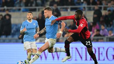 Lazio's Ciro Immobile in action with AC Milan's Fikayo Tomori. Reuters