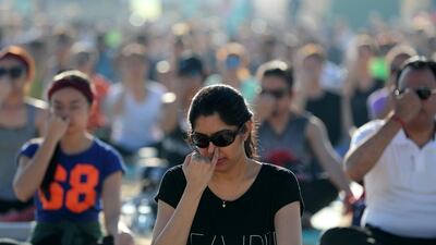 A mass yoga session hosted by Bollywood actress Malaika Arora as part of X Yoga Dubai on March 16, 2018 at Kite Beach, Dubai. Chris Whiteoak / The National