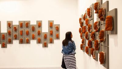 A visitor at India Art Fair 2020. Courtesy India Art Fair 2020