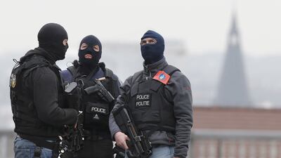 Masked Belgian police secure the area around the Palais de Justice courthouse in Brussels on March 24, 2016. Christian Hartmann/Reuters