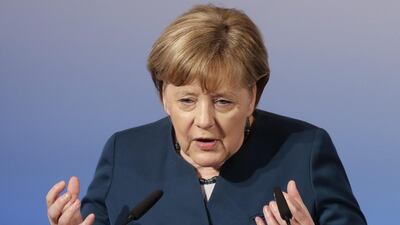 German chancellor Angela Merkel speaks during the Munich Security Conference. Matthias Schrader / AP Photo