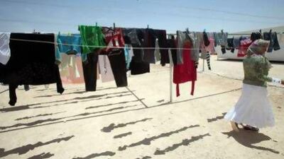 A Syrian refugee at the UAE-funded camp in Jordan’s Mrajeeb Al Fhood area, which was inaugurated yesterday by Sheikha Lubna Al Qasimi, Minister of Development and International Cooperation. The “five-star” camp will house more than 25,000 people, mostly children. Salah Malkawi / The National