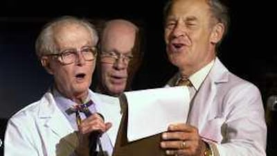 The Nobel Prize winners, from left, William Lipscomb (chemistry 1976), Robert Wilson (physics 1978) and Dudley Herschbach (chemistry 1986) join in song during the 2001 Ig Nobel awards ceremony.