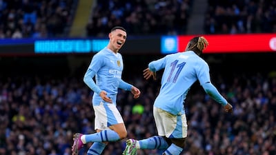 Phil Foden celebrates scoring the fourth goal. PA