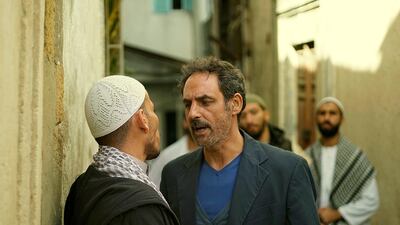 A still from ‘Fatwa’, starring Tunisian actor Ahmed Hafiane, right, as divorced father Brahim Nadhour.