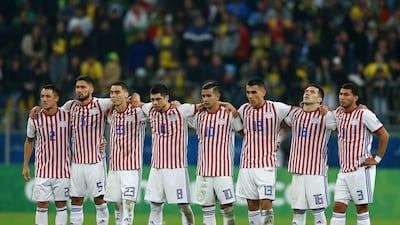 Players of Paraguay line up during the penalty shootout. Getty Images