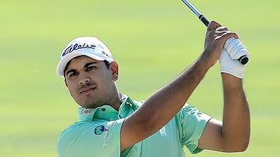 Gaganjeet Bhullar of India is being followed around the Abu Dhabi Golf Club by a fair number of his countryman as he climbs up the 2014 Abu Dhabi HSBC Golf Championship leaderboard. David Cannon / Getty Images