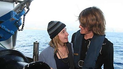 Abby Sunderland, left, meets with her brother Zac, after being rescued from an aborted solo attempt to sail around the world. Sunderland's boat was crippled by storms.