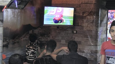 Liverpool fans celebrate in Cairo. Adham Youssef