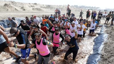 About 5,000 people took part in the longer, tougher Dubai Spartan Race.