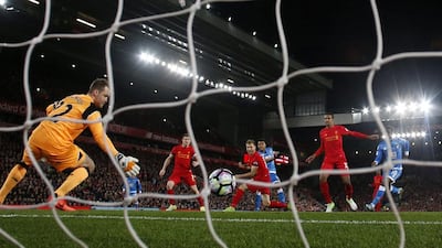 Bournemouth's Joshua King scores their second goal against Liverpool on Wednesday. The teams played to a 2-2 draw. Jason Cairnduff / Reuters