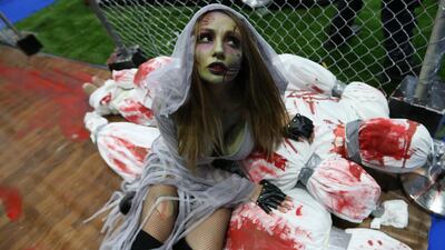 epa07500141 A guest dressed as a zombie attends Middle East Film and Comic Con. EPA