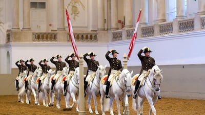 The Spanish Riding School perform the Quadrille at the Winter Riding School in Vienna.