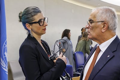 Francesca Albanese speaks to Palestinian ambassador Ibrahim Mohammad Khraishi after delivering her report on the war in Gaza. EPA