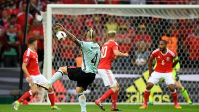 Belgium midfielder Radja Nainggolan shoots to score the opening goal of the match. Matthias Hangst / Getty Images