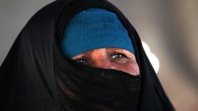 A displaced Iraqi woman looks on in a camp for internally displaced people near al-Khalidiyeh in Iraq's western Anbar province.While the election campaign is in full swing elsewhere in Iraq, the country's displaced camps barely register on the radars of those running for office, despite housing hundreds of thousands of people. Ahmad Al Rubaye / AFP
