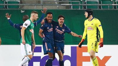 Arsenal's Pierre-Emerick Aubameyang celebrates scoring their second goal with Hector Bellerin. Reuters