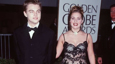 Leonardo DiCaprio and Kate Winslet, in a lace spaghetti-strap gown, attend the Golden Globe Awards at the Beverly Hilton Hotel in Los Angeles, California, on January 18, 1998. Getty Images