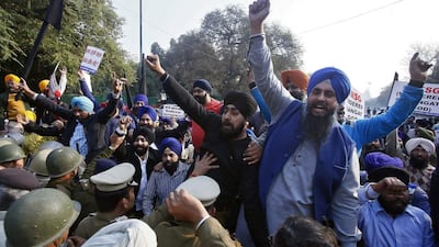 Members of New Delhi’s Sikh community clash with police while protesting the release of MSG: The Messenger of God. Reuters