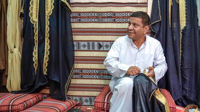 Mohammad Ismail, 45, has been a cloak maker for more than 21 years.