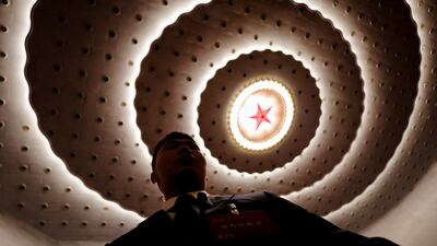 A security guard takes position at the opening session of the Chinese People's Political Consultative Conference, at the Great Hall of the People in Beijing. Reuters